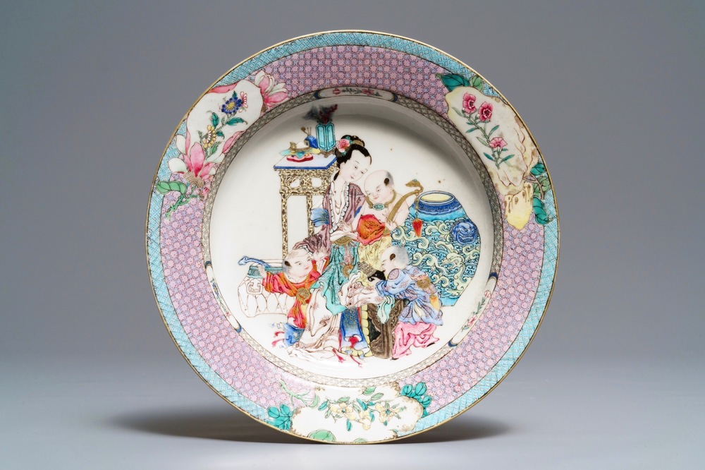 A fine Chinese famille rose 'ruby back' eggshell plate with a lady with three boys, Yongzheng